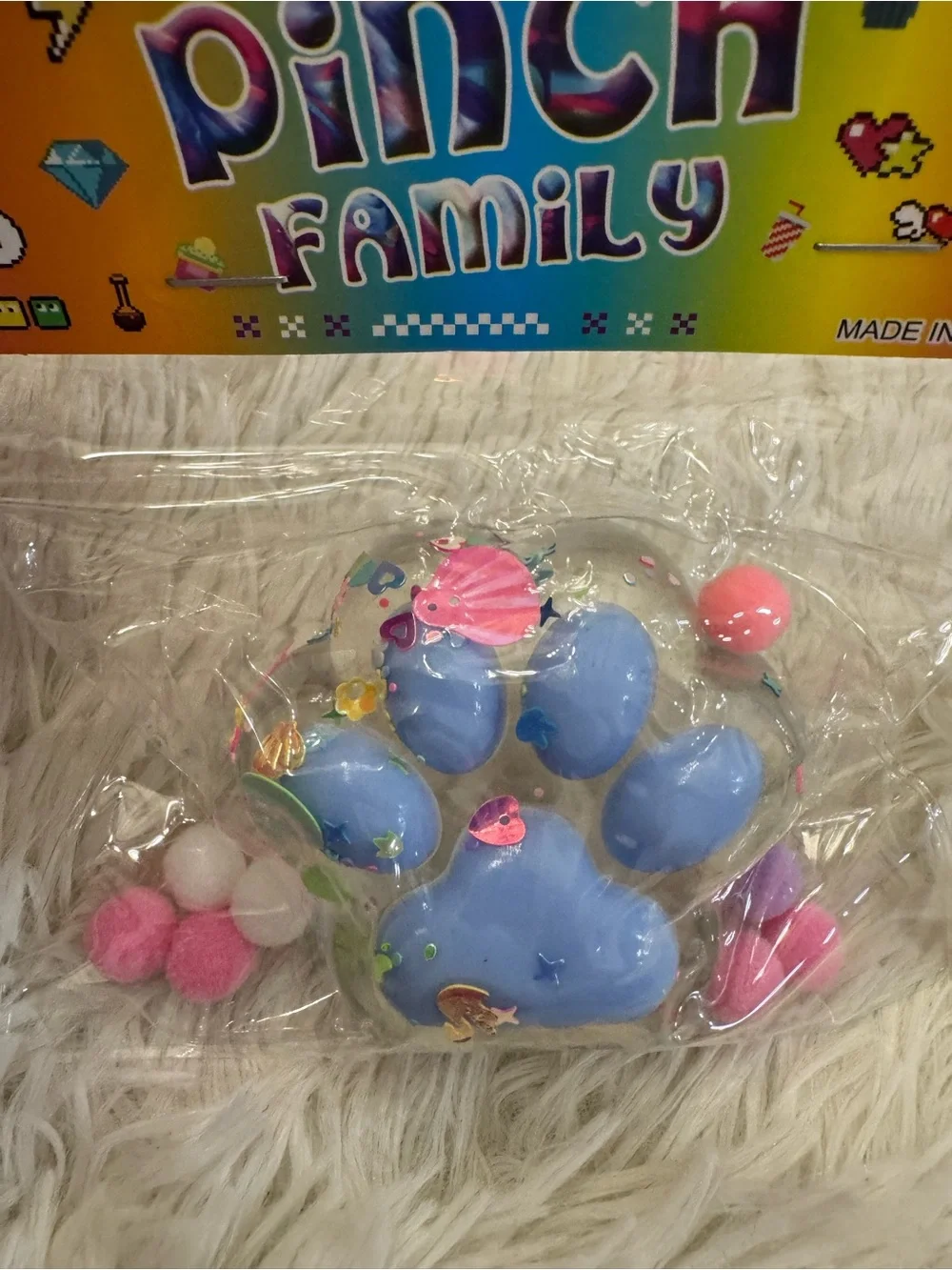 Blue Paw squishy with Pom Poms and confetti